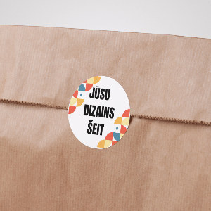 Round sticker with logo on a kraft paper bag
